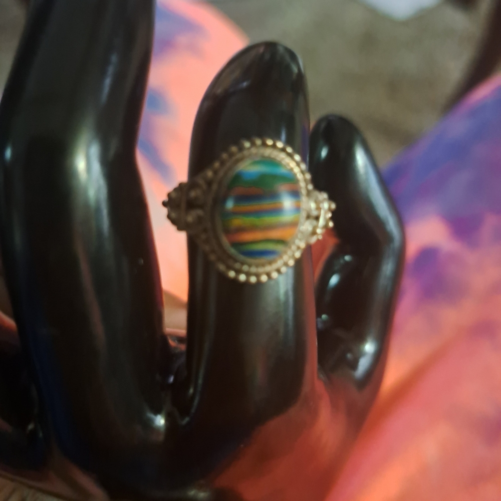 Rainbow Calsilica oval sterling silver ring